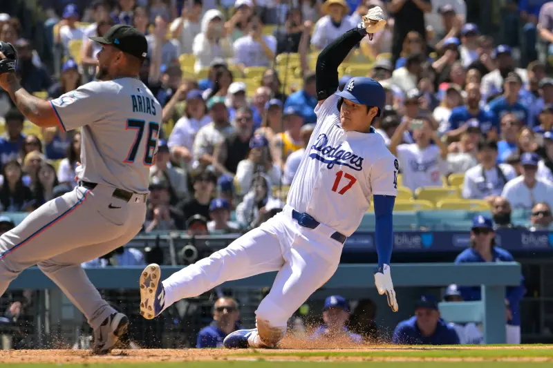 ▲洛杉磯道奇以12：7橫掃邁阿密馬林魚，投手Gonsolin傷癒復出奪勝，大谷翔平敲出三壘安打並跑回3分。（圖／路透／達志影像）