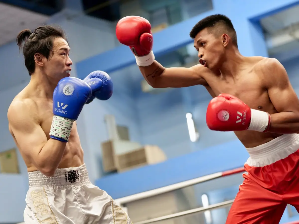 ▲台、港拳王賴主恩、袁文俊，在臺北市青年盃暨全國職業拳擊菁英錦標賽交手。（圖／臺北市青年盃提供）