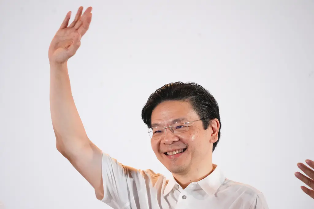 ▲新加坡第14屆全國大選在昨（3）晚落幕，執政的人民行動黨（PAP）65.57％的得票率高於2020年國會大選的61.24％，在國會97個議席中，拿下87個議席。這是黃循財接任總理以來首次帶領執政黨出征大選，順利拿下漂亮勝利。（圖／美聯社／達志影像）