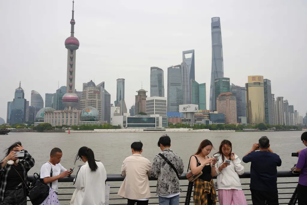 ▲中國五一長假結束，但相關旅遊數據仍未恢復至疫情前水準。（圖／美聯社／達志影像）