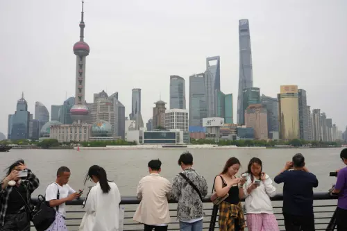 ▲中國五一長假結束，但相關旅遊數據仍未恢復至疫情前水準。（圖／美聯社／達志影像）