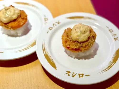 ▲「塔塔醬酥炸特大帆立貝」整顆炸製，一口咬下吃得到多汁貝肉。（圖／記者蕭涵云攝）