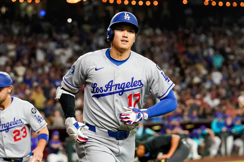 ▲道奇全場火力全開，包含大谷翔平的第13號全壘打、金慧成大聯盟生涯首轟，終場以9：3橫掃對手，穩坐國聯西區龍頭。（圖／美聯社／達志影像）