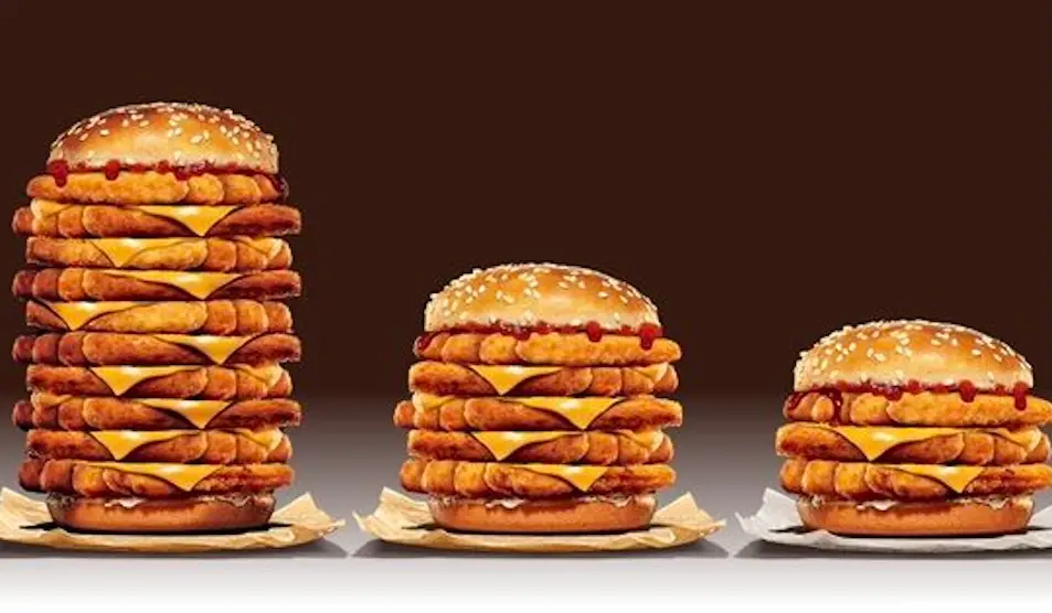 ▲漢堡王上個月掀起「10層犇牛堡」搶購風潮，明（16）日起再推出「10層雞薯條堡」，把「雞薯條」包進漢堡，最多一次能包40條。（圖／漢堡王提供）