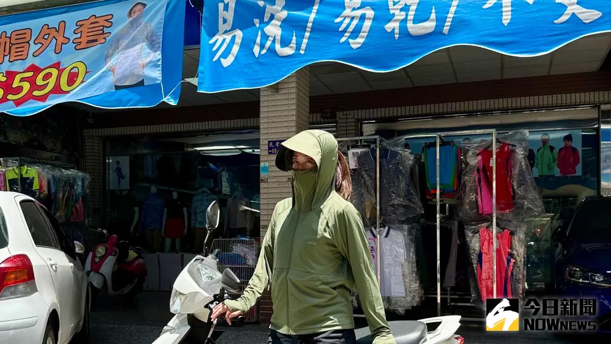 ▲夏天酷熱難耐，不少人外出穿「防曬外套」防護。（示意圖／記者陳美嘉攝，2025.05.23）