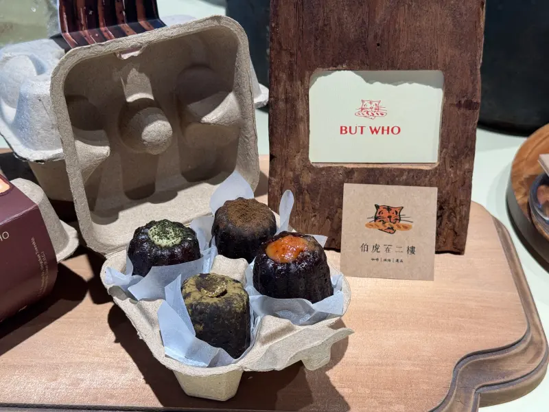 ▲誠品生活台南店5/28起試營運，試營運、開幕優惠整理包，恆春的人氣文青咖啡廳「伯虎在二樓」可麗露買一送一。（圖／記者鍾怡婷攝）