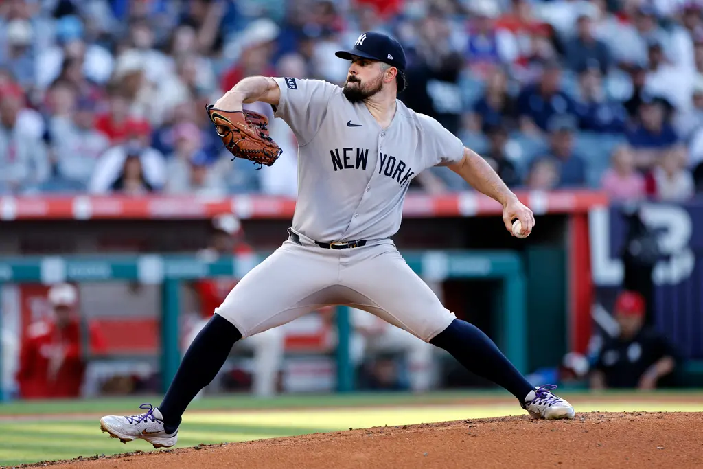 ▲美國職業棒球大聯盟（Major League Baseball）效力於紐約洋基隊的王牌左投Carlos Rodón昨（28）日迎戰洛杉磯天使隊繳出主投七局無失分、狂飆10K的優質先發內容。（圖／美聯社／達志影像）