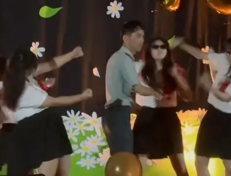 ▲嘉義女中李政陽教官畢業典禮上台跟畢業生一起尬舞，現場尖叫聲不斷，而該教官也被許多網友認出是自己當兵時的連長，引起討論。（圖/Threads）