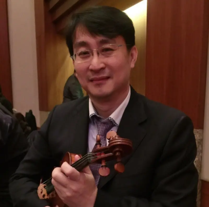 ▲王文洋的小提琴老師張鎮洲捲入跨國名琴交易糾紛。(圖/翻攝臉書)