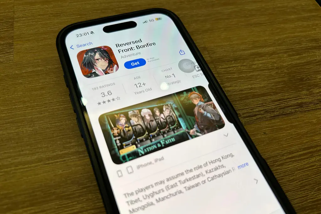 ▲香港國安處10日發布公告，稱台灣手機遊戲《逆統戰：烽火》涉宣揚「台獨」、「港獨」等分裂國家的主張，提醒香港民眾下載或在遊戲內「課金」，都有可能違反《國家安全法》，呼籲市民切勿以身試法。（圖／美聯社／達志影像）