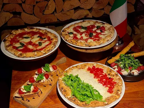 台北微風廣場內的義式餐廳「Rosmarino」,推出義大利國慶節活動,披薩全品項第二顆半價。(圖/記者鍾怡婷攝) ▲台北微風廣場內的義式餐廳「Rosmarino」,推出義大利國慶節活動,披薩全品項第二顆半價。(圖/記者鍾怡婷攝)