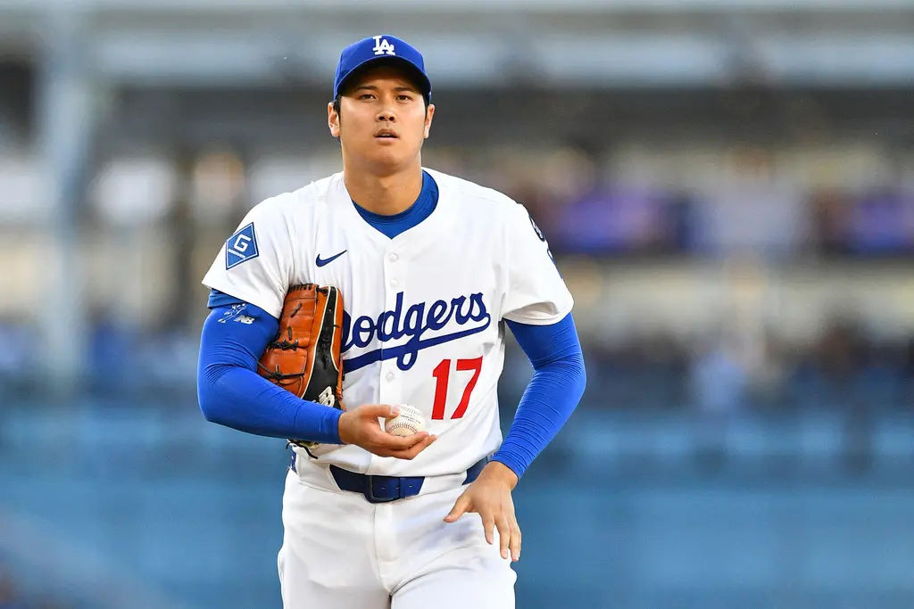 ▲大谷翔平連2戰都只投一局就退場，引發外界關於他是否有可能轉任終結者的話題，今日練球日道奇總教練Dave Roberts明確地表示不會讓大谷擔任牛棚投手，原因在於熱身時間。（圖／美聯社／達志影像）