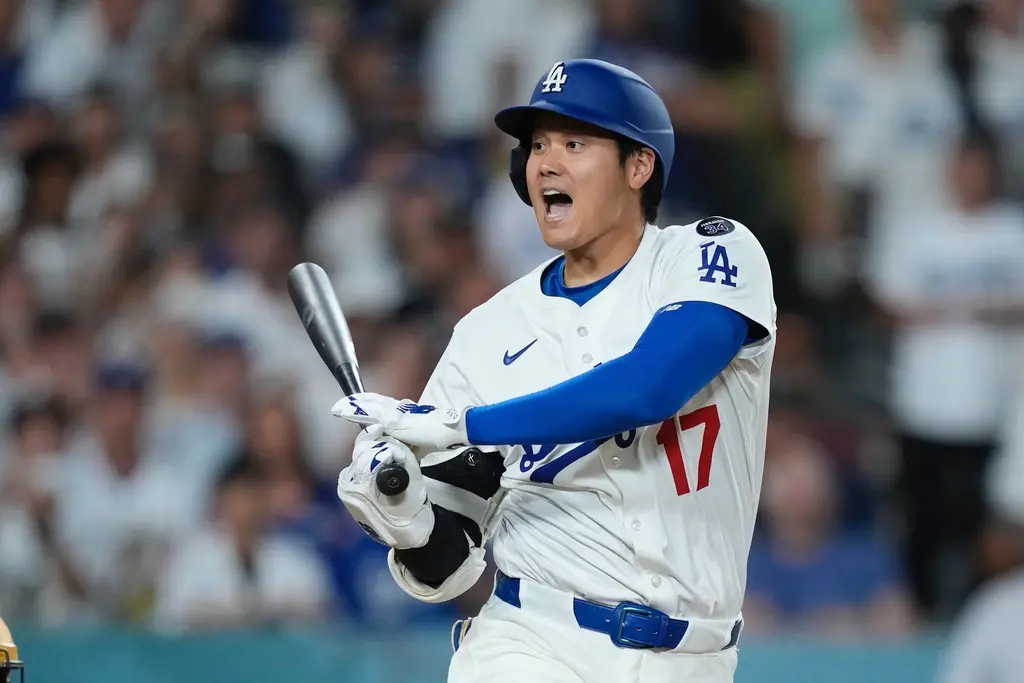▲洛杉磯道奇今（22）日與國民隊進行系列賽第2戰，結果投手群遭國民演出5轟煙火秀，終場道奇以3：7落敗。陣中二刀流好手大谷翔平此役4打數掛零，苦吞2次三振。（圖／美聯社／達志影像）