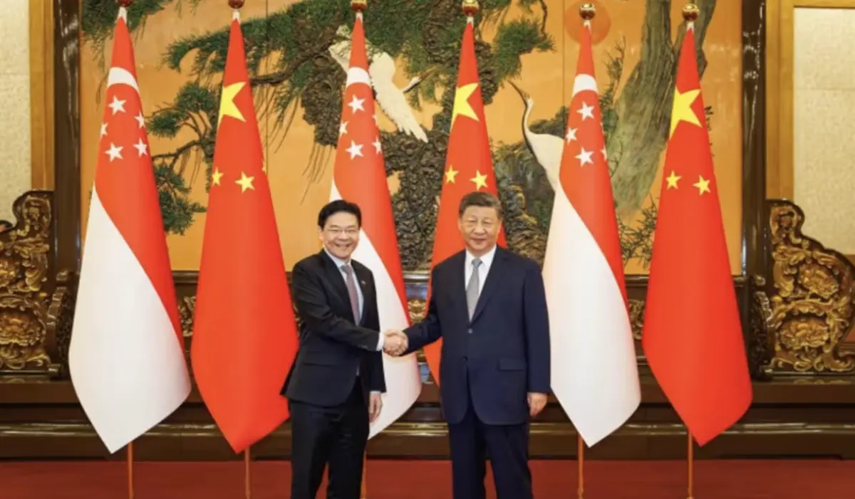 ▲新加坡總理黃循財24日上午在北京人民大會堂會晤中國國家主席習近平。（圖／翻攝自亞洲新聞台）