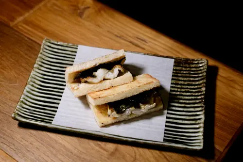 ▲「星鰻三明治」裡的山葵Cream Cheese畫龍點睛，讓三明治整體滋味鮮美不膩。（圖／記者葉盛耀攝）