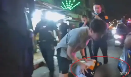 影／新店男玩賓果輸1萬潑油搶彩券行10萬　下班員警路過圍捕
