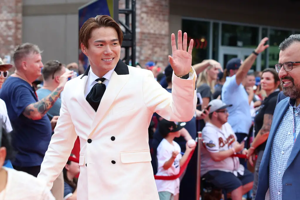 ▲明星賽前進行球員一一介紹時，當國聯板凳球員被逐一點名，山本由伸的名字剛被讀出，就引來現場一陣噓聲。（圖／美聯社／達志影像）