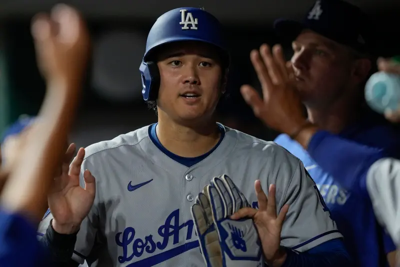 ▲杉磯道奇球星大谷翔平於美國時間7月28日對戰辛辛那提紅人隊的比賽中，以先發第二棒、指定打擊身分先發出賽，繳出3打數1安打2打點1得分的表現，達成本季大聯盟最快的「100得分」里程碑。（圖／美聯社／達志影像）