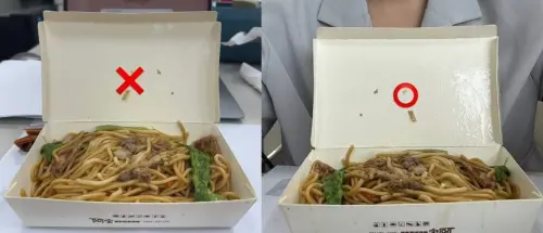 ▲吃麵時將免洗紙盒轉180度,讓上方紙板變成「隔板」,避免醬汁噴濺到上衣。(圖/翻攝自Threads) ▲吃麵時將免洗紙盒轉180度,讓上方紙板變成「隔板」,避免醬汁噴濺到上衣。(圖/翻攝自Threads)