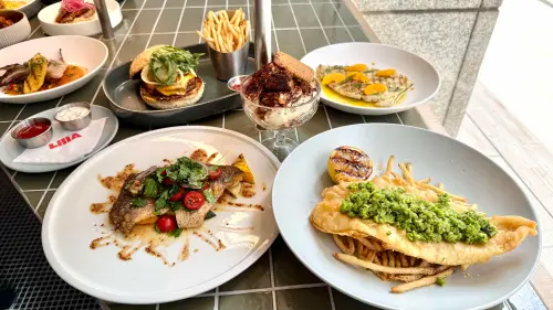 ▲開展餐飲新美式餐廳LillA進駐信義區百貨Dream Plaza，開吃川味口水雞肉丸、蒜蓉奶油海鮮麵、巨大聖代等好吃菜色，搭配TCRC聯名汲引調酒立飲假日喝到2點，菜單價格、訂位。（圖／記者蕭涵云攝）