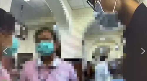 ▲臺大醫院6日發生一起醫療糾紛，病患闖入診間毆打醫生，警方到場後向護理師瞭解案情。(圖／翻攝畫面)