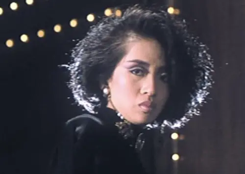 ▲梅艷芳曾在香港影壇與樂壇都紅極一時，當然會成為黑道糾纏的目標。（圖／摘自HKMDB）