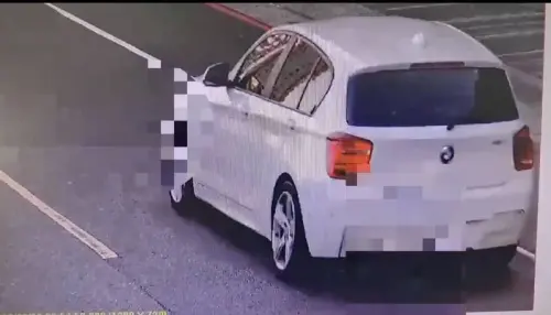 ▲槍手逃逸時的BMW。（圖／翻攝畫面）