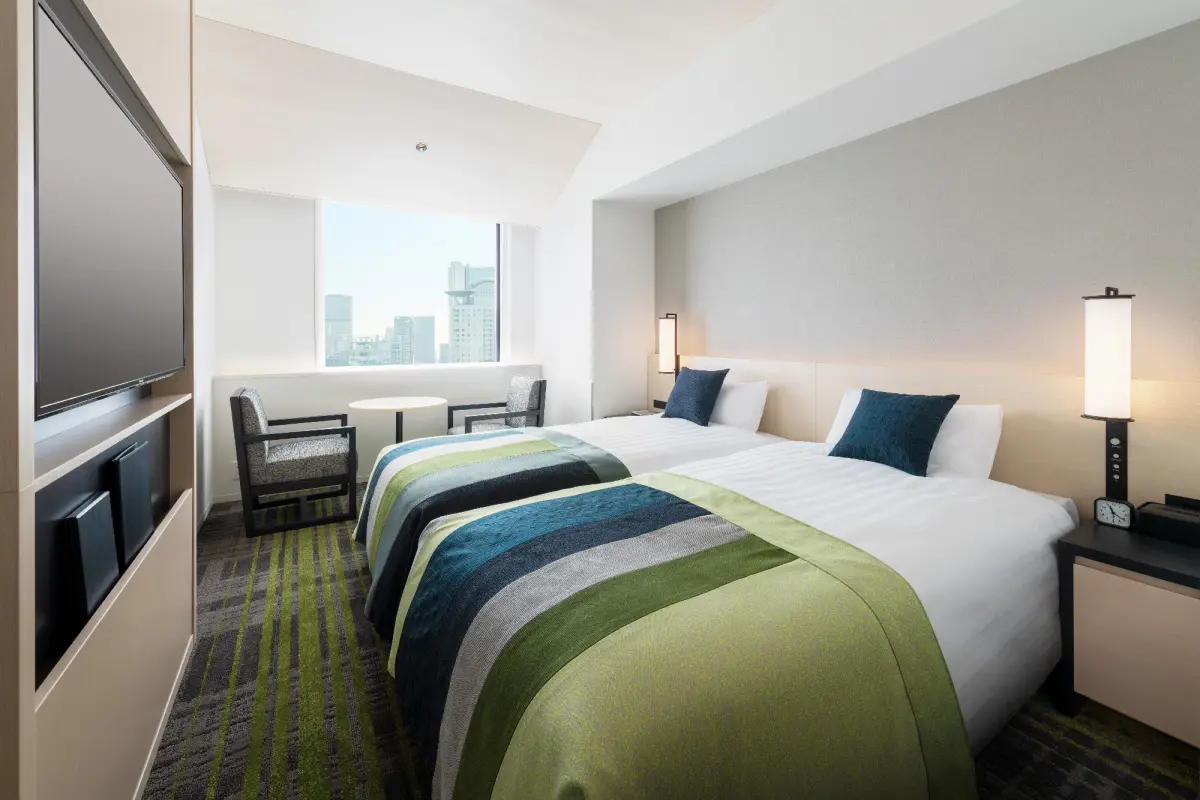 ▲可樂旅遊宣布「99搶搶購」一日快閃促銷即將於9月9日開賣，多種優惠包含國內外飯店最低999元起，圖為阪急大阪龍仕柏飯店標準雙床房，限量特賣2,999元起。（圖／可樂旅遊提供）