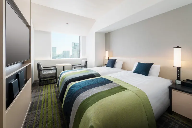 ▲可樂旅遊宣布「99搶搶購」一日快閃促銷即將於9月9日開賣，多種優惠包含國內外飯店最低999元起，圖為阪急大阪龍仕柏飯店標準雙床房，限量特賣2,999元起。（圖／可樂旅遊提供）