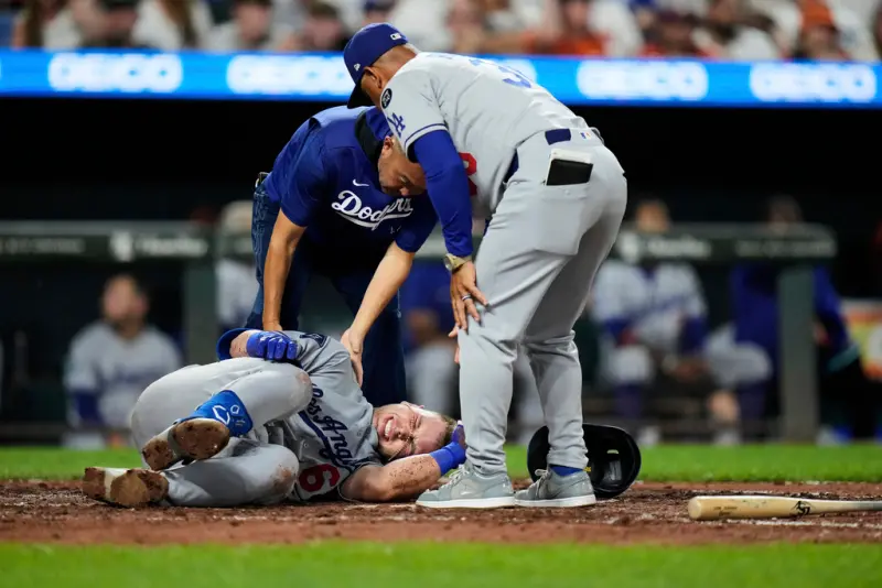 ▲MLB美國職業棒球大聯盟（Major League Baseball）洛杉磯道奇（Los Angeles Dodgers）捕手新星魯辛（Dalton Rushing）在昨（6）日因傷退場後確定進入傷兵名單。（圖／美聯社／達志影像）
