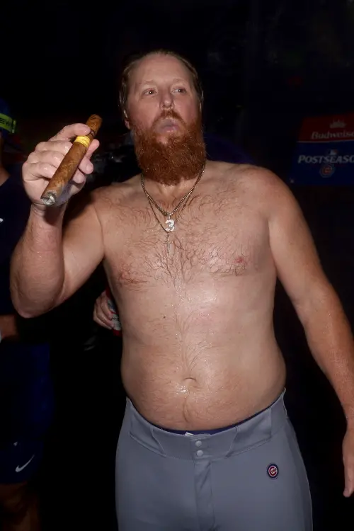 ▲特納（Justin Turner）正抽著勝利雪茄。（圖／美聯社／達志影像）