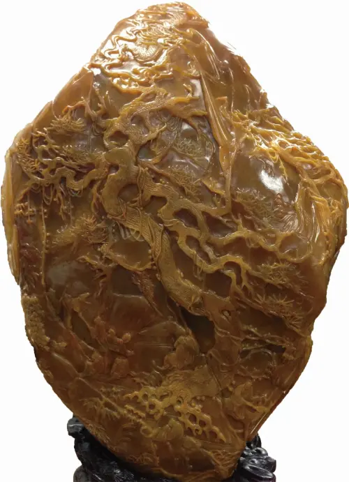 ▲「叠璧山房」帶來石卿大師薄意巨制〈十八羅漢〉田黃石。（圖／台北文華藝博提供）