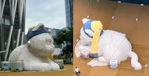 ▲樺加沙颱風24日將登陸廣東，深圳灣萬象城外的巨型貓咪雕塑被綁上巨石，避免遭強風吹走。（圖／翻攝自微博）