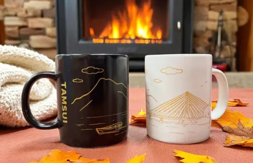 ▲「2025淡水藝術嘉年華」的紀念品「走著橋杯」。（圖／取自新北旅客臉書）