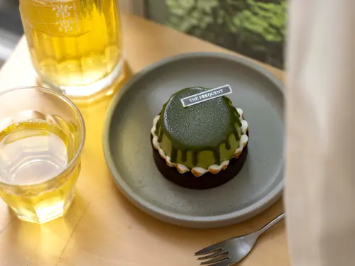 ▲「抹茶小山」以抹茶象徵阿里山，檸檬奶油夾心象徵太陽，而外表裝飾的蛋白霜則是雲海，意境很美的一道甜點。（圖／嘉義市衛生局提供）