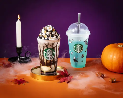 ▲星巴克「夜幕狂想曲星冰樂」中杯190元、大杯210元、特大杯230元，另有「冰搖可可脆粒楓糖燕麥咖啡」中杯165元、大杯180元、特大杯195元。（圖／星巴克提供）