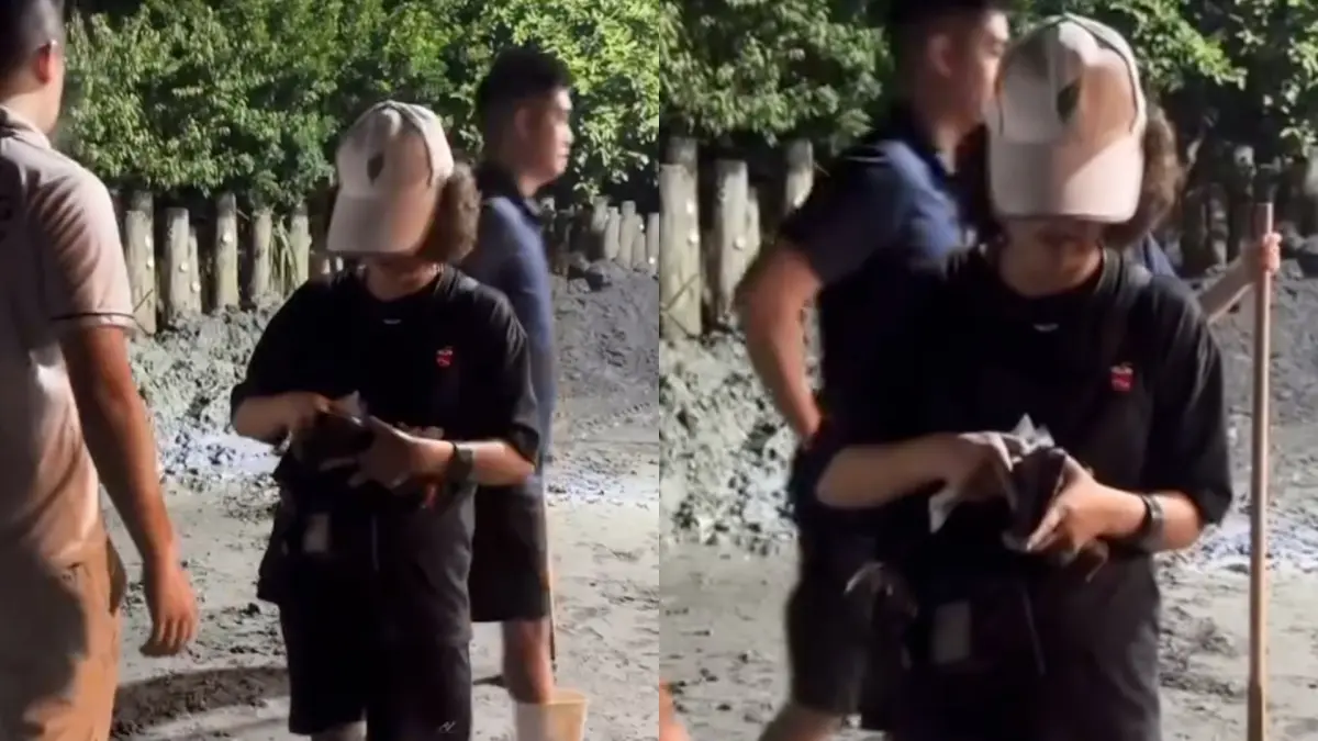 ▲花蓮阿姨為了感謝鏟子超人協助救災，從錢包拿出鈔票試圖塞錢給志工。（圖／翻攝自Threads）