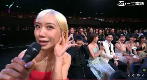 ▲安心亞反問「你說交往還是得獎？」引發全場暴動，甚至讓Lulu壞笑狂喊「有貓膩！有貓膩！」（圖／翻攝金鐘獎YT）