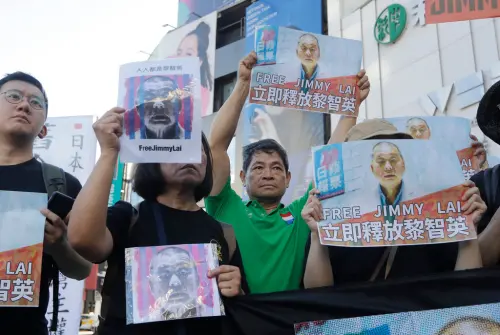 ▲圖為台灣與香港的活動人士在台北聲援香港壹傳媒創辦人黎智英。（圖／美聯社／達志影像）