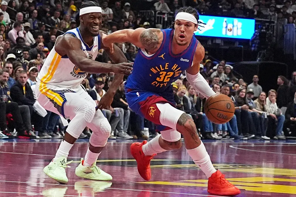 ▲丹佛金塊在主場以強勢火力壓制來訪的金州勇士，半場打完以66：49領先17分，展現爭冠氣勢。（圖／美聯社／達志影像）