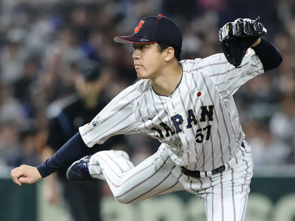 ▲為備戰明年3月登場的2026年世界棒球經典賽（World Baseball Classic），日本武士代表隊（侍Japan）於12月24日正式發表全新WBC限定版隊服。（圖／美聯社／達志影像）