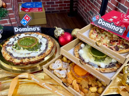 ▲達美樂推出「一擲High狂歡盒」，一次開吃三本柱3款新品。（圖／記者蕭涵云攝）