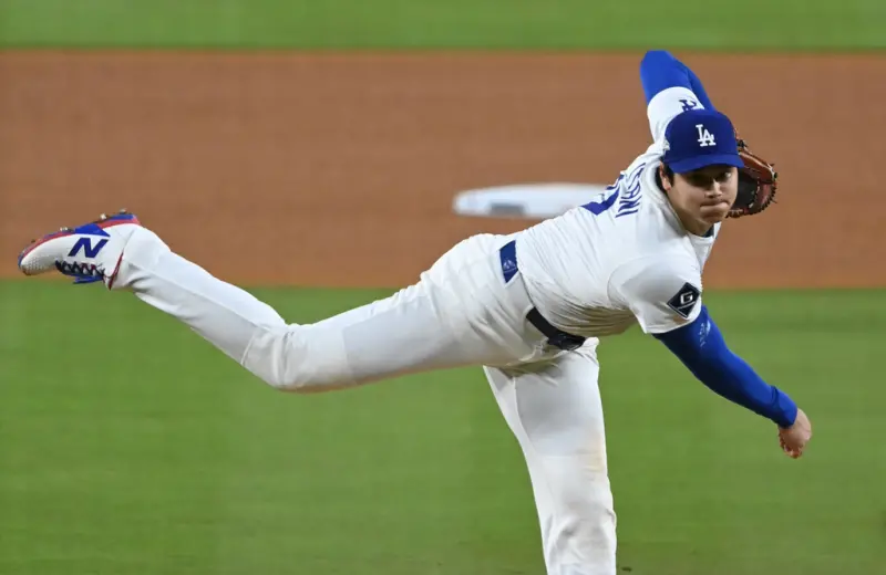 ▲MLB官方今（4）日公布今年知名音樂串流平台「Spotify」上最常被提及的球員前5名，其中洛杉磯道奇二刀流巨星大谷翔平再度蟬聯第一名，寫下另類「連霸」紀錄，而山本由伸今年也成功上榜，排在第4名。（圖／美聯社／達志影像）