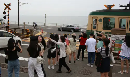 沒在管習近平！中國客爽衝日本《灌籃高手》聖地拍照、泡溫泉
