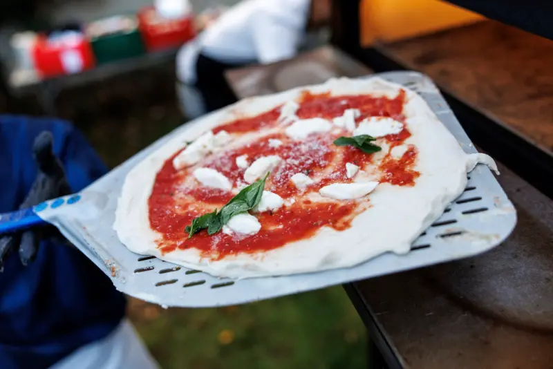 ▲聯合國教科文組織（UNESCO）10日在印度德里舉行的大會上正式宣布，將「義大利美食」列入人類非物質文化遺產名錄。義大利披薩示意圖。（圖／美聯社／達志影像）