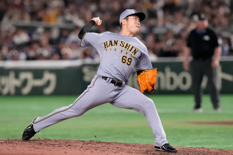 ▲「無雙戰神」石井大智，今年寫下如電玩般的夢幻賽季，整季出賽53場僅失1分、防禦率0.17，今（12）日確定被阪神虎大幅度加薪，從原本的8200萬日幣，一口氣上升至明年的2億日幣。（圖／美聯社／達志影像）