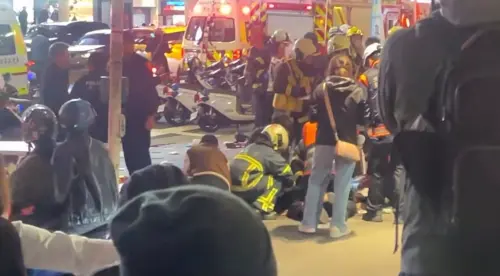 ▲台北車站一名男子亂丟擲煙霧彈後逃至中山站，隨機砍人後從百貨公司墜樓。（圖／民眾提供）