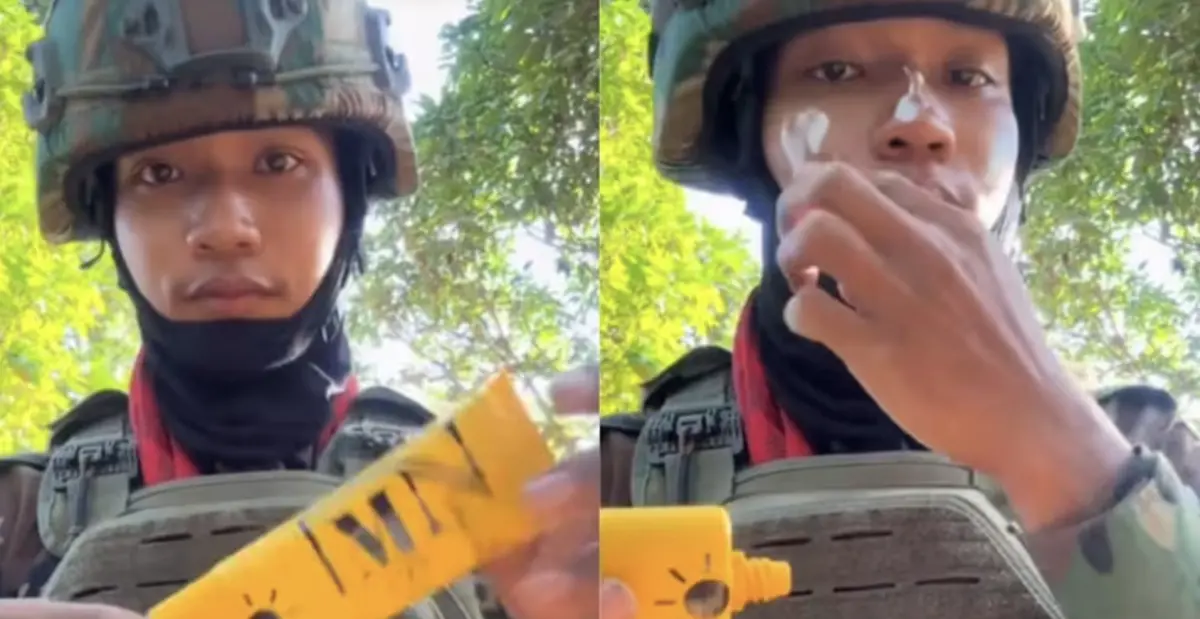 ▲一名柬埔寨士兵在戰區背景下開直播推銷防曬乳，身後不時傳出槍聲，畫面反差引發討論。（圖／翻攝自Thairath）
