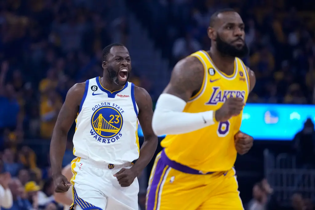 ▲名嘴Bill Simmons的建議，向金州勇士爭取四冠前鋒格林（Draymond Green），讓他與其好兄弟「詹皇」詹姆斯（LeBron James）攜手合作，藉此全面升級防守強度。（圖／美聯社／達志影像）