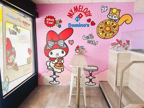 ▲可愛美樂蒂陪大家吃披薩。（圖／達美樂dominos.com.tw）